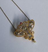 A heavy high carat gold Art Nouveau pendant mounte