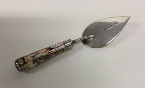 A Victorian silver and porcelain mounted trowel of