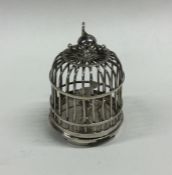 A novelty silver table toy in the form of a Chines