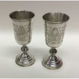 RUSSIAN: A pair of good silver goblets with engrav