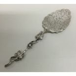 A large Continental cast silver preserve spoon. Ap