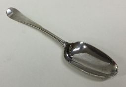 An 18th Century crested silver dessert spoon. Appr