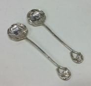 A good pair of Chinese silver spoons with textured