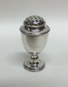 A good Victorian silver pepperette with lift-off c