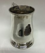 A large Georgian silver pint mug of typical form w