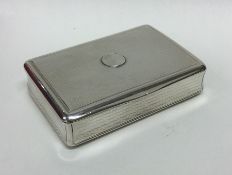 A heavy George III silver snuff box of engine turn