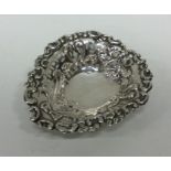A small pierced silver bonbon dish of heart shaped