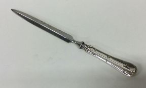 A modern silver letter opener with steel blade. Lo