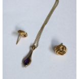 An amethyst mounted pendant together with gold ear