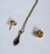 An amethyst mounted pendant together with gold ear