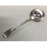 An early Victorian silver sauce ladle. London 1849.