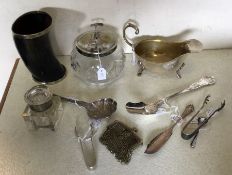 A good collection of plated items including ladles