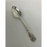 A Georgian bottom marked picture back silver teasp