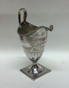 A good Georgian silver cream jug on square base. L