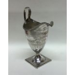 A good Georgian silver cream jug on square base. L