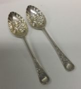 A good pair of Victorian silver berry spoons attra