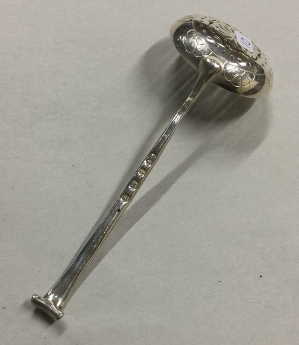 A heavy silver sifter spoon with engraved bowl. Bi - Image 2 of 2