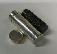 An unusual early 18th Century tubular silver nutme