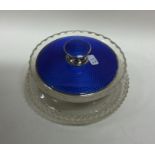 An attractive blue enamel and silver mounted glass