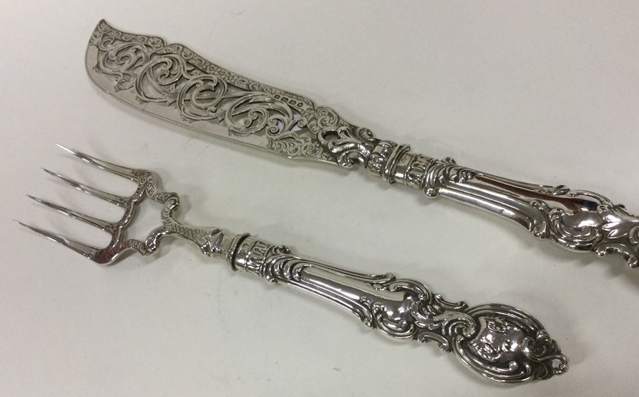 A large pair of silver fish servers with chased ha - Image 2 of 2