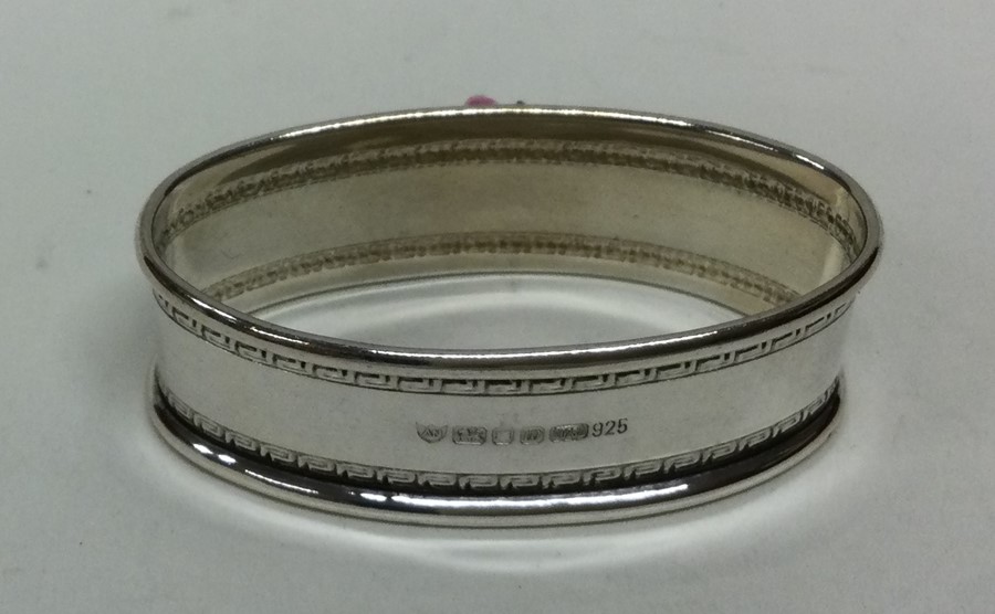 A silver and porcelain mounted napkin ring decorat - Image 3 of 3