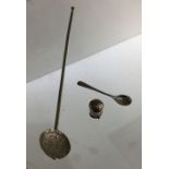 A small Continental silver ladle together with a s