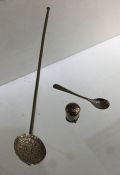 A small Continental silver ladle together with a s