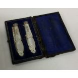 A good pair of cased silver fruit knives with MOP