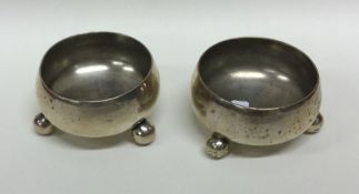 A pair of Victorian silver cylindrical salts on ba