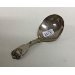 A fiddle pattern silver caddy spoon. London. Appro