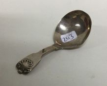 A fiddle pattern silver caddy spoon. London. Appro