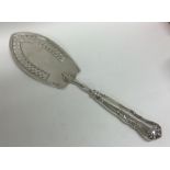 RUSSIAN: A heavy silver fish slice with pierced bl