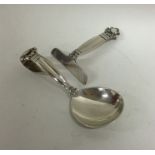 GEORG JENSEN: An unusual silver pusher and spoon o