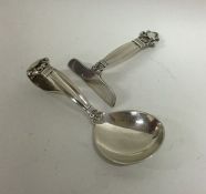 GEORG JENSEN: An unusual silver pusher and spoon o