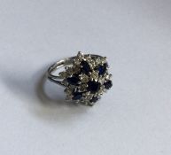 A sapphire and diamond large cluster ring of shape