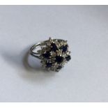 A sapphire and diamond large cluster ring of shape