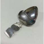 A rare Georgian silver caddy spoon in the form of