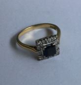 An 18 carat sapphire and diamond Art Deco cluster