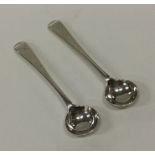A pair of Georgian silver OE pattern salt spoons.