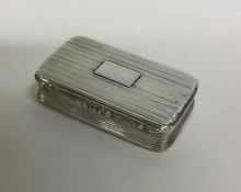 A George III silver reeded snuff box. Birmingham 1