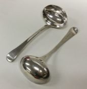 A pair of OE pattern silver sauce ladles. London 1