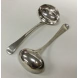 A pair of OE pattern silver sauce ladles. London 1