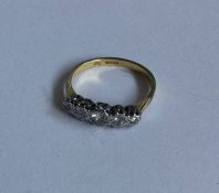 A good diamond five stone half hoop ring in two co