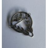 GEORG JENSEN: A stylish silver brooch in the form