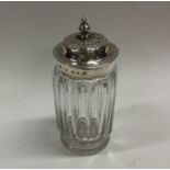 A Victorian silver mounted glass sugar caster. She