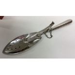 A rare George III hinged silver fish server / slic