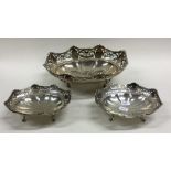 An Edwardian silver three piece sweet dish set wit