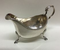 DUBLIN: A Georgian Irish silver sauce boat of typi