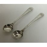 A pair of George II bright cut and crested silver