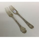 Two silver christening forks engraved with flowers